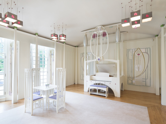 View of the Music Room in the House for an Art Lover, with art-nouveau chairs, chandeliers and piano, with Charles Rennie Mackintosh motifs