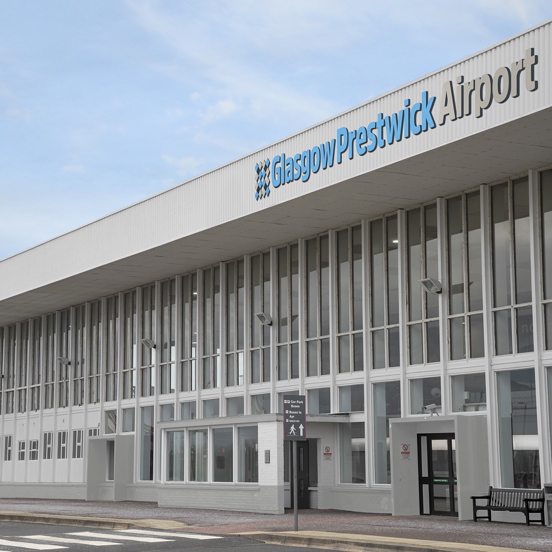 Large square building with Glasgow Prestwick Airport sign